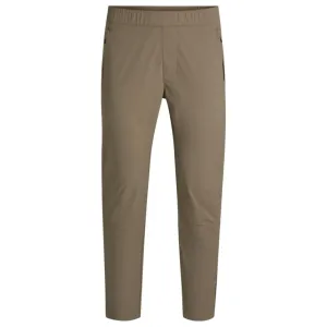 Tapered-leg trousers in water-repellent stretch fabric