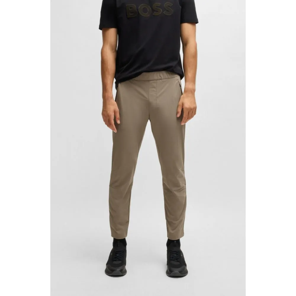 Tapered-leg trousers in water-repellent stretch fabric